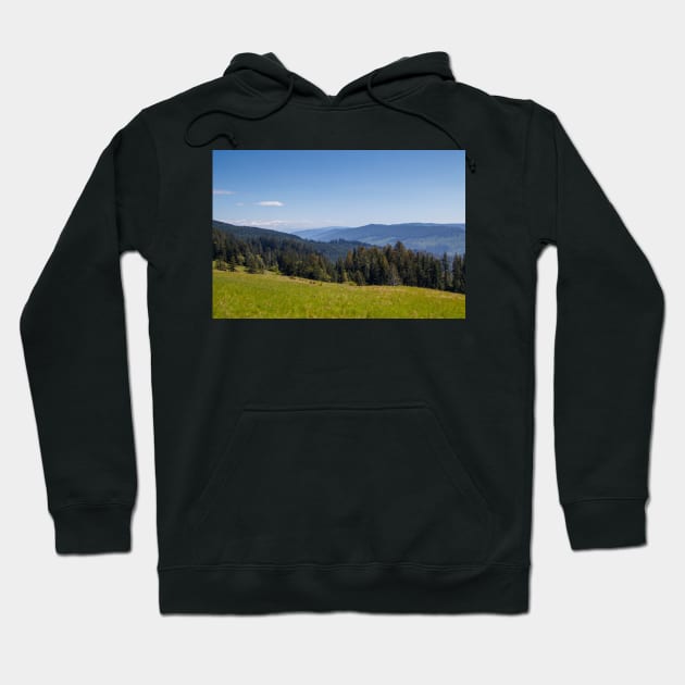 Blue sky and mountains Hoodie by blossomcophoto